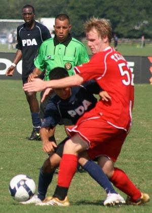 Elite boys club soccer players compete.